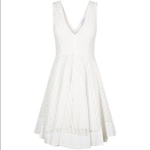 Sandro Crochet Fit and flare silhouette V neck sleeveless seamed waist dress